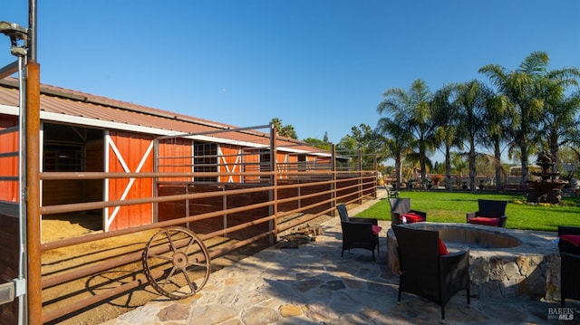 view of patio with an outdoor structure