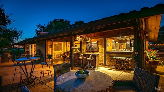 view of patio at twilight