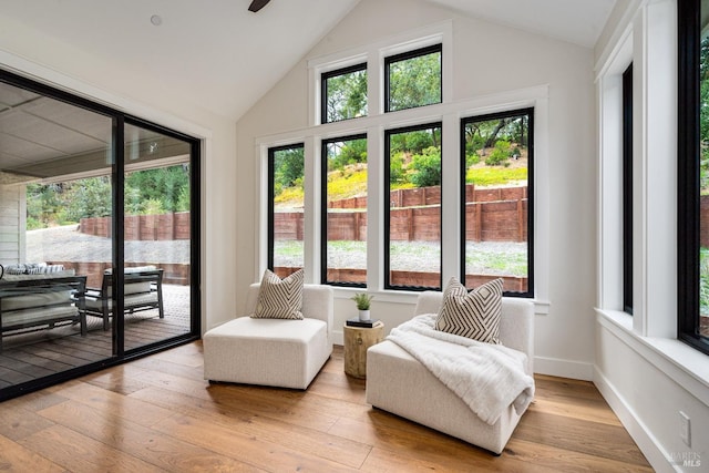 sunroom with vaulted ceiling