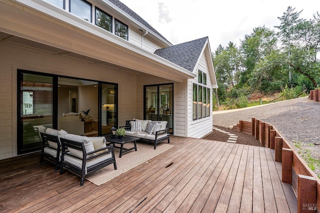 wooden terrace featuring an outdoor hangout area