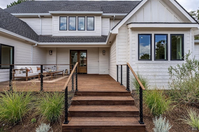 entrance to property with a wooden deck