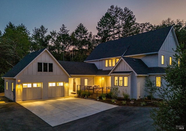 modern farmhouse style home with a garage