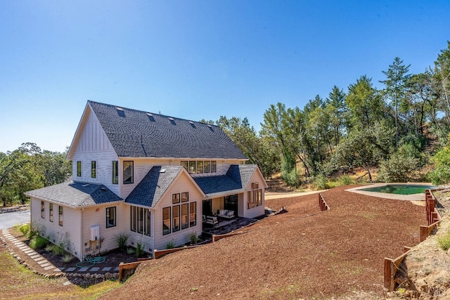 rear view of property with a patio area