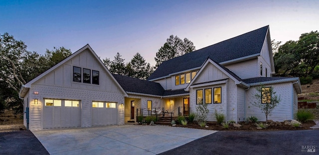 modern farmhouse style home with a garage