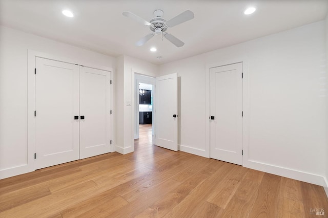 unfurnished bedroom featuring recessed lighting, baseboards, ceiling fan, and light wood finished floors