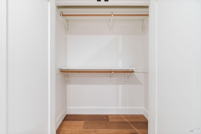 walk in closet featuring light wood-type flooring