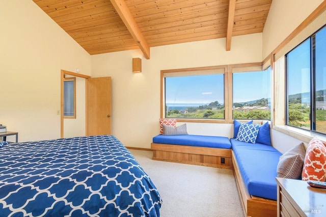 bedroom featuring wood ceiling, vaulted ceiling with beams, and carpet floors