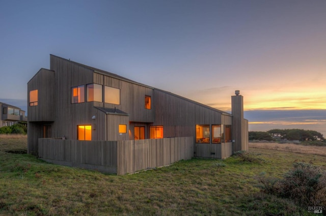 view of property exterior at dusk