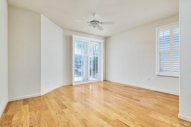 unfurnished room featuring ceiling fan and light hardwood / wood-style flooring