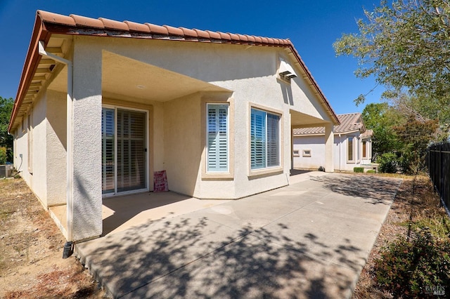 rear view of property with a patio area