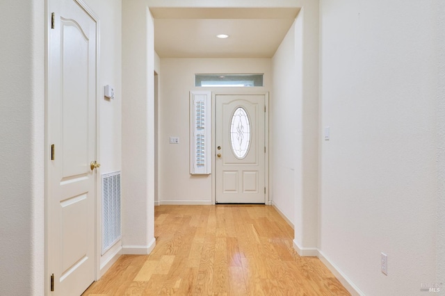 entrance foyer with light hardwood / wood-style floors