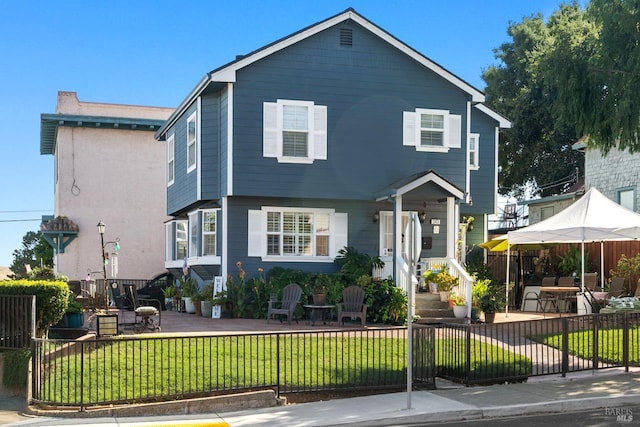 front facade with a front lawn