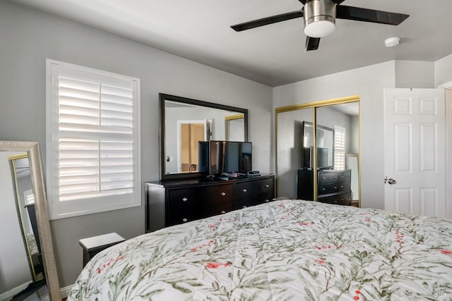 bedroom featuring a closet and ceiling fan