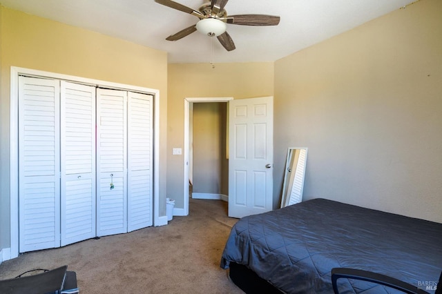 bedroom featuring carpet, a closet, and ceiling fan