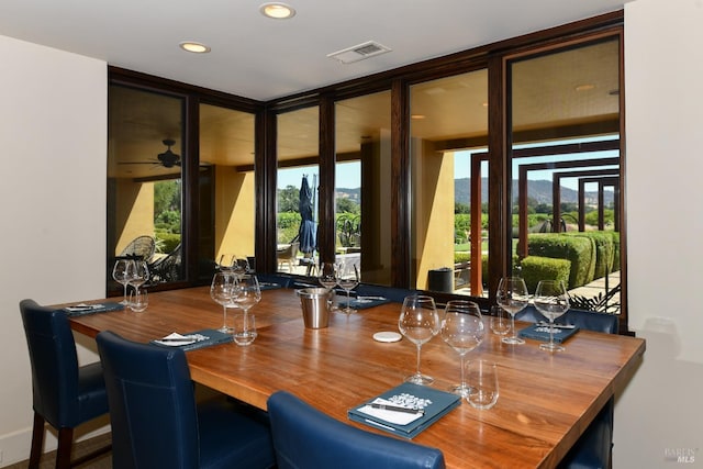 dining room with recessed lighting and visible vents