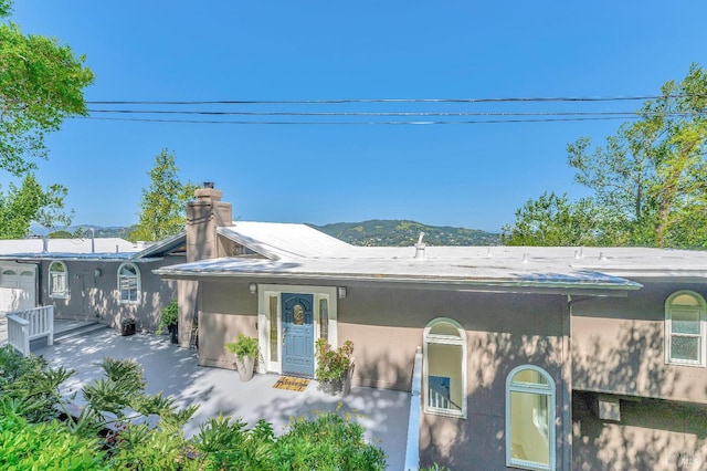 exterior space with a mountain view