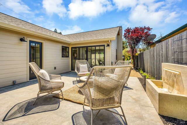 view of patio with fence