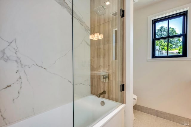 bathroom featuring  shower combination and toilet