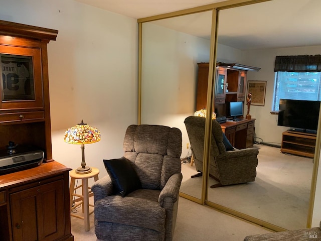 living room featuring light carpet