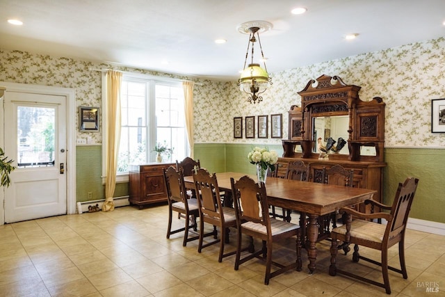 dining space with baseboard heating