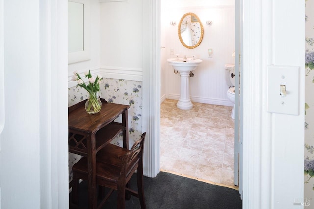 bathroom with toilet and sink