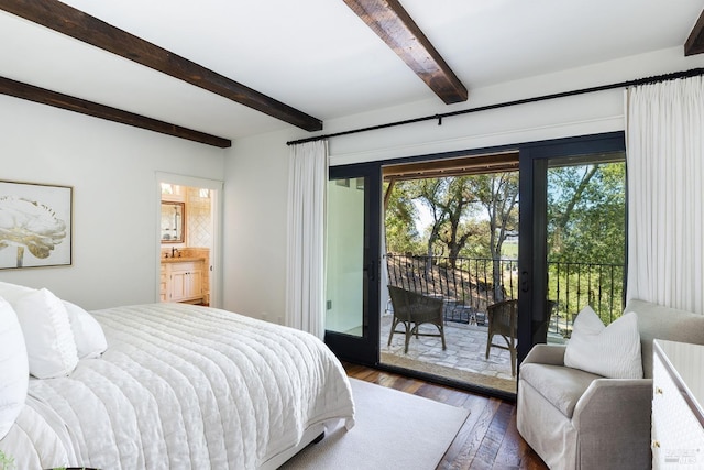bedroom featuring hardwood / wood-style floors, access to exterior, a sink, ensuite bath, and beam ceiling