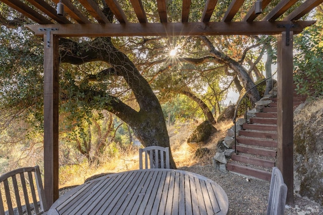 wooden terrace featuring stairway