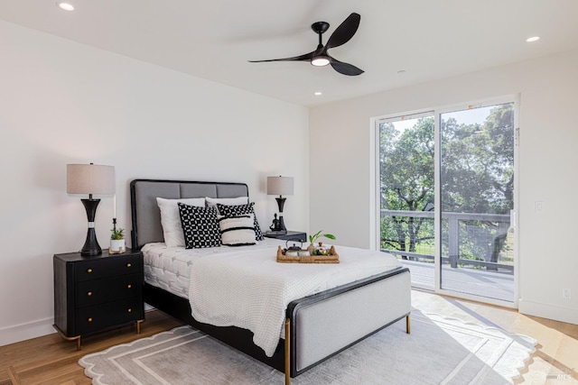 bedroom with hardwood / wood-style flooring, access to exterior, and ceiling fan