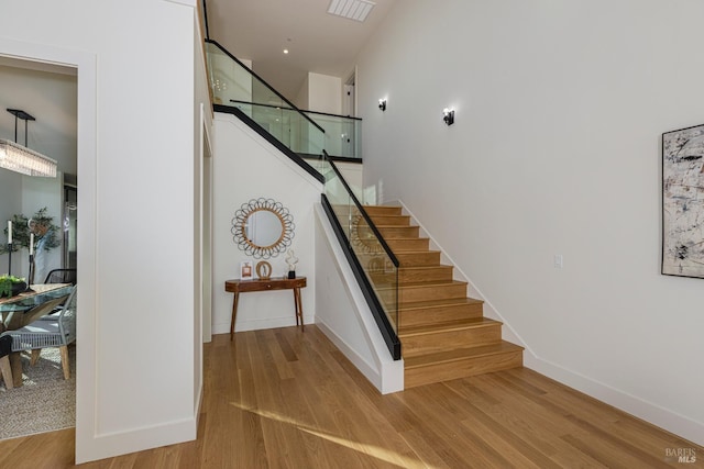 stairway with wood-type flooring