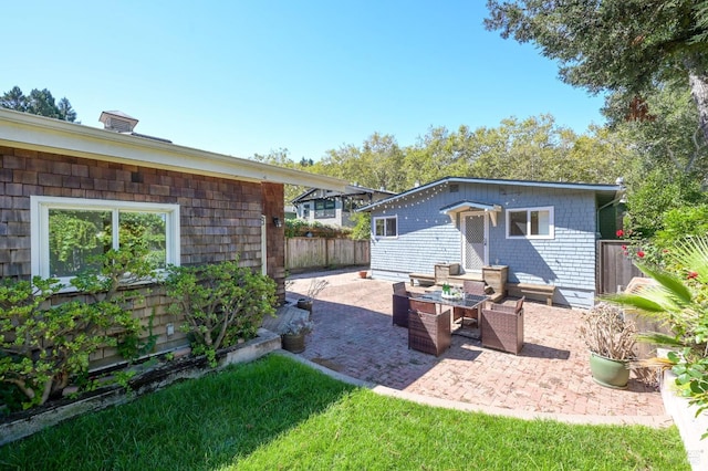 rear view of house with a patio area