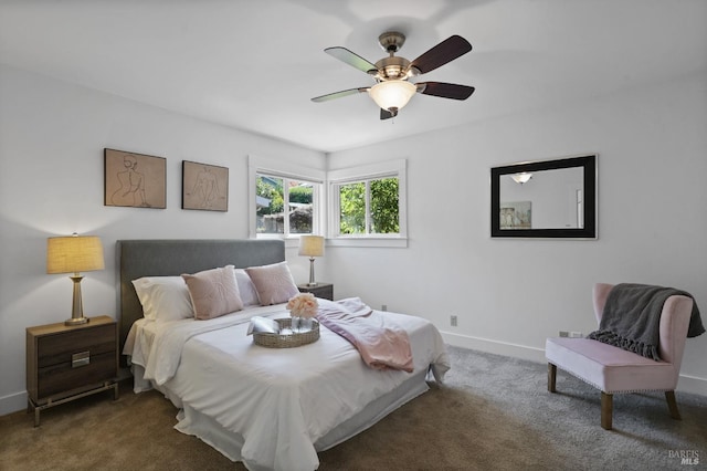 bedroom with ceiling fan and dark colored carpet