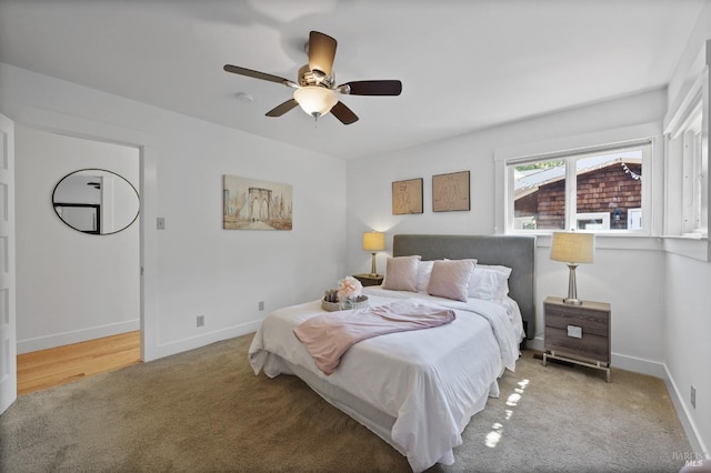 bedroom featuring ceiling fan and wood-type flooring