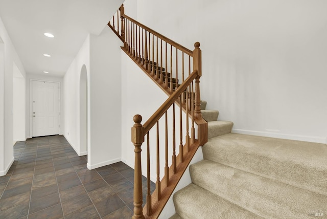 staircase with carpet