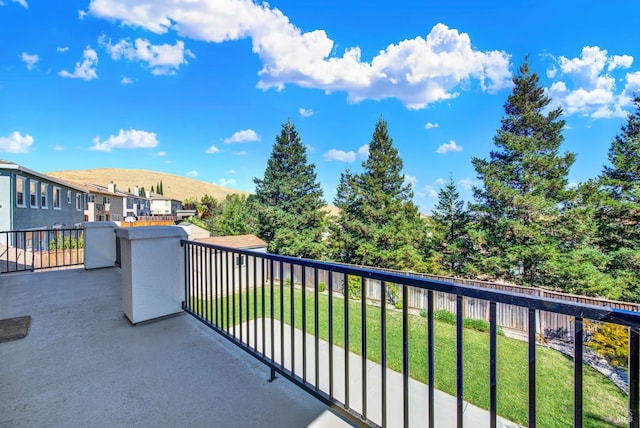 balcony featuring a mountain view