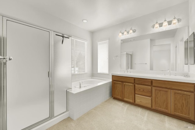 bathroom with plus walk in shower and vanity