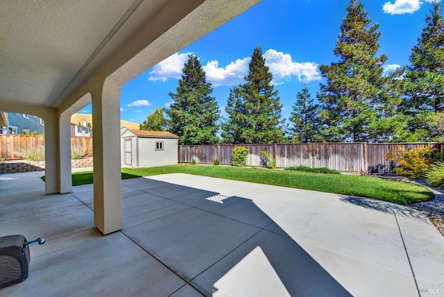 view of patio / terrace featuring a storage shed