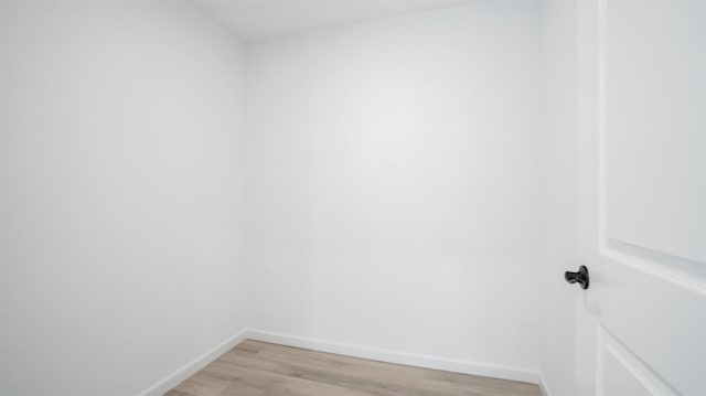 spare room with light hardwood / wood-style floors