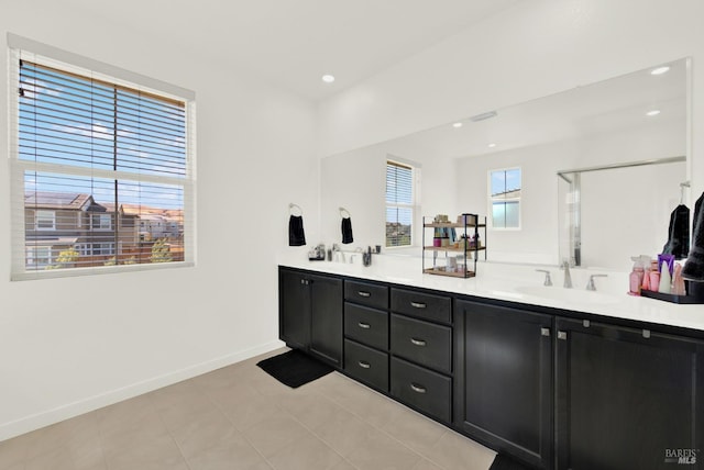 2464 Lake Club Dr, Fairfield, CA 94533 - full bath with a sink, recessed lighting, tile patterned flooring, baseboards, and double vanity