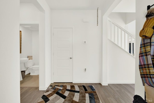 2464 Lake Club Dr, Fairfield, CA 94533 - foyer entrance featuring baseboards, stairway, and wood finished floors