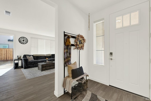 2464 Lake Club Dr, Fairfield, CA 94533 - foyer with baseboards, visible vents, and wood finished floors