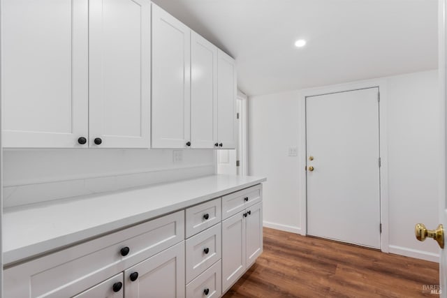 interior space featuring dark wood-type flooring