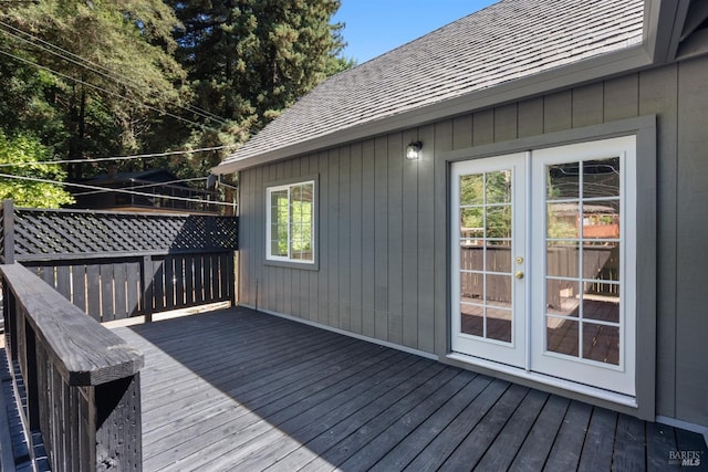 wooden deck featuring french doors