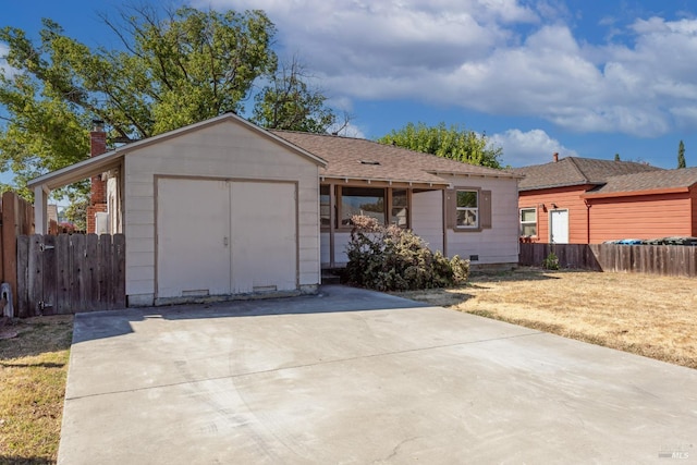 ranch-style home featuring a front yard