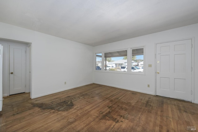 entryway with dark hardwood / wood-style floors