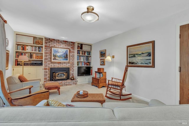 living room featuring carpet flooring and built in shelves