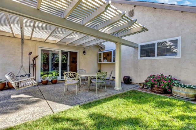 view of patio featuring a pergola