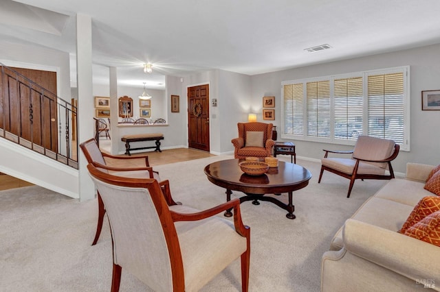 living room with light colored carpet