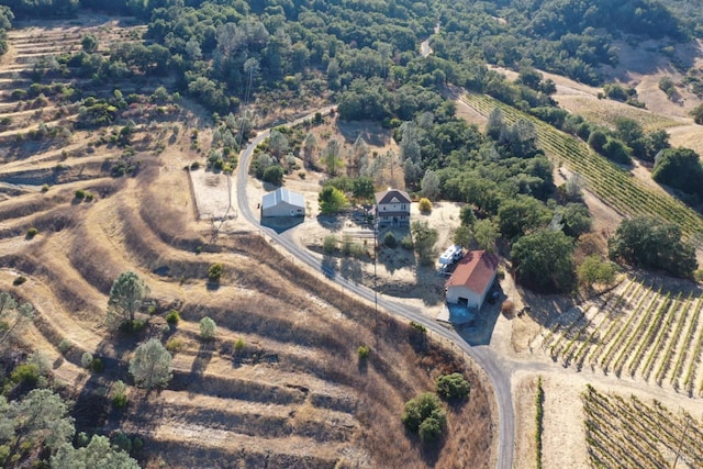 birds eye view of property featuring a rural view