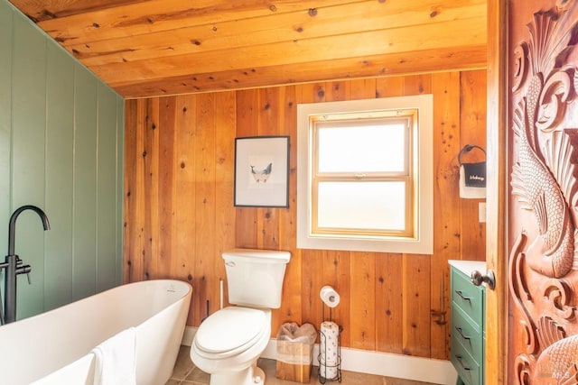 bathroom featuring a tub, wooden ceiling, toilet, tile patterned floors, and wooden walls