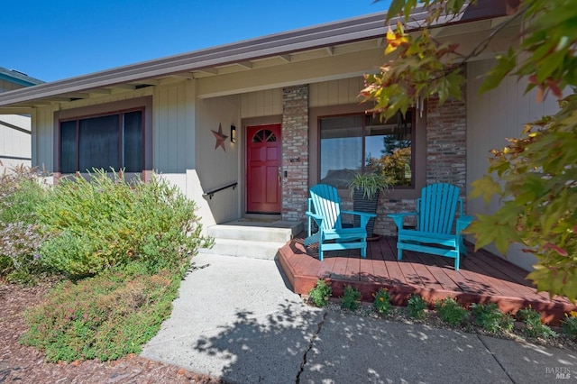 doorway to property with a porch